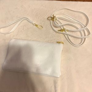 White purse. VERY spacious! Feel free to make an offer!